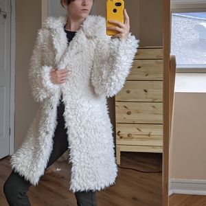 White faux fur coat